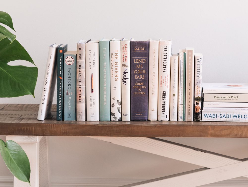A book sitting on top of a bookshelf