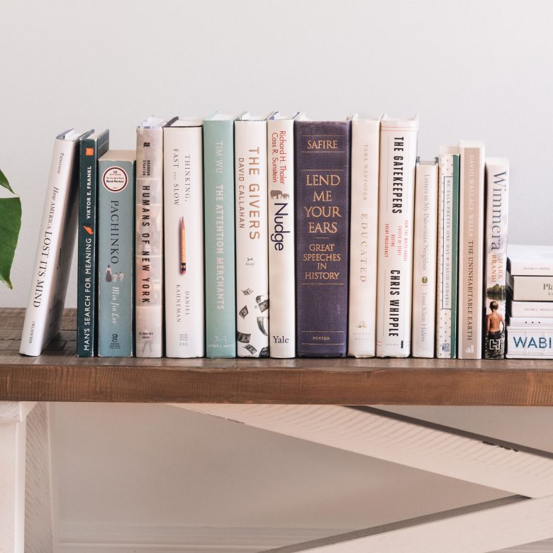 A book sitting on top of a bookshelf
