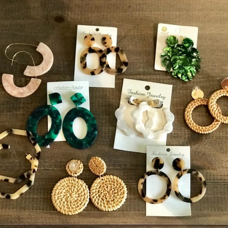 A bunch of different types of doughnuts on a table