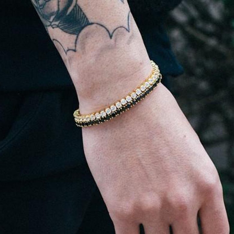 A person holding a tattoo
